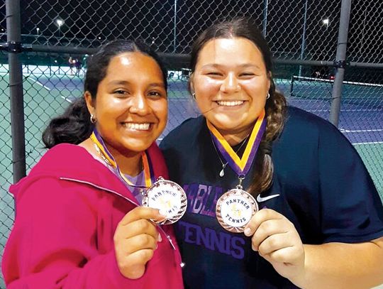 Mia Hernandez (left) and Sophia Trudeau placed third in the A Division of girls doubles at the Liberty Hill tournament April 11.