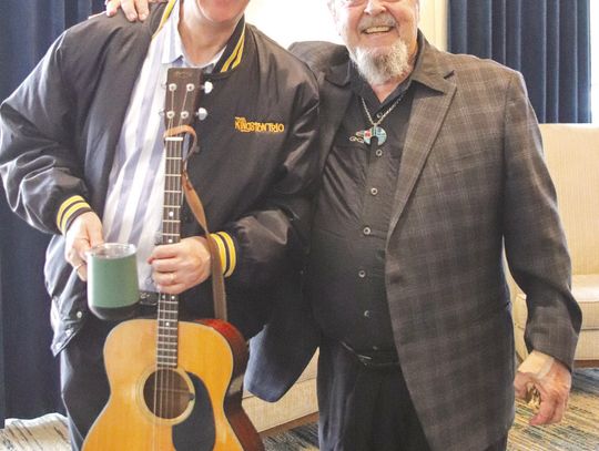 Buddy Woodward greeted Bob Linder before the show started April 6, Horseshoe Bay Cultural Enrichment program featuring the Kingston Trio.