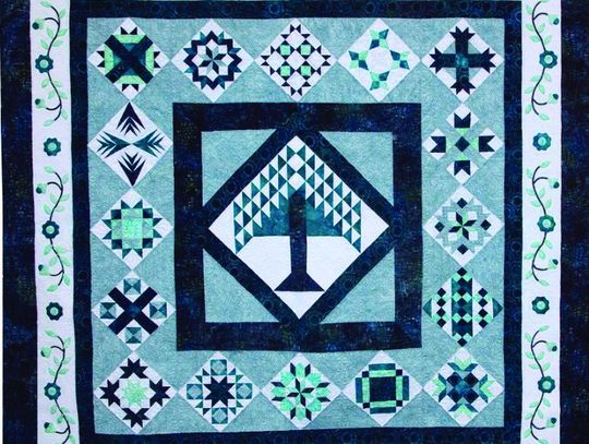 Contributed photo The quilt titled Tranquility (88”x88”) was masterfully sewn by 30 experienced guild members who invested approxi mately 1,200 hours of their time, and guild member Leslie Sparks lovingly quilted Tranquility on her longarm quilting machine.