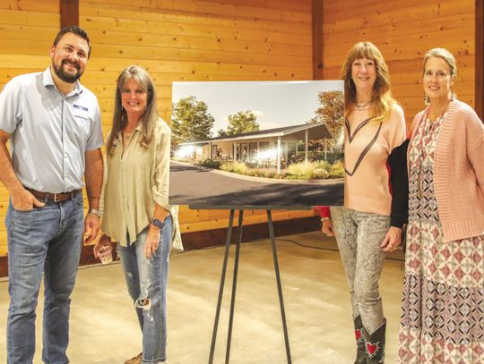Andy Virdell, Mina Martin, Barbara Rosenberger and Teresa Gray flanked a depiction of The Hall Feb. 11 at Log Country Cove. Find related story on Page 1. Photos by Martelle Luedecke/Luedecke Photography