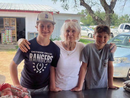 Youth volunteer at Sharing the Harvest food pantry