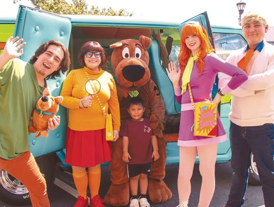 Aydann Martinez stood with Scooby amongst the gang for Mystery on Main Oct. 12 presented by Ms Lollipop's. Photos by Martelle Luedecke/Luedecke Photography