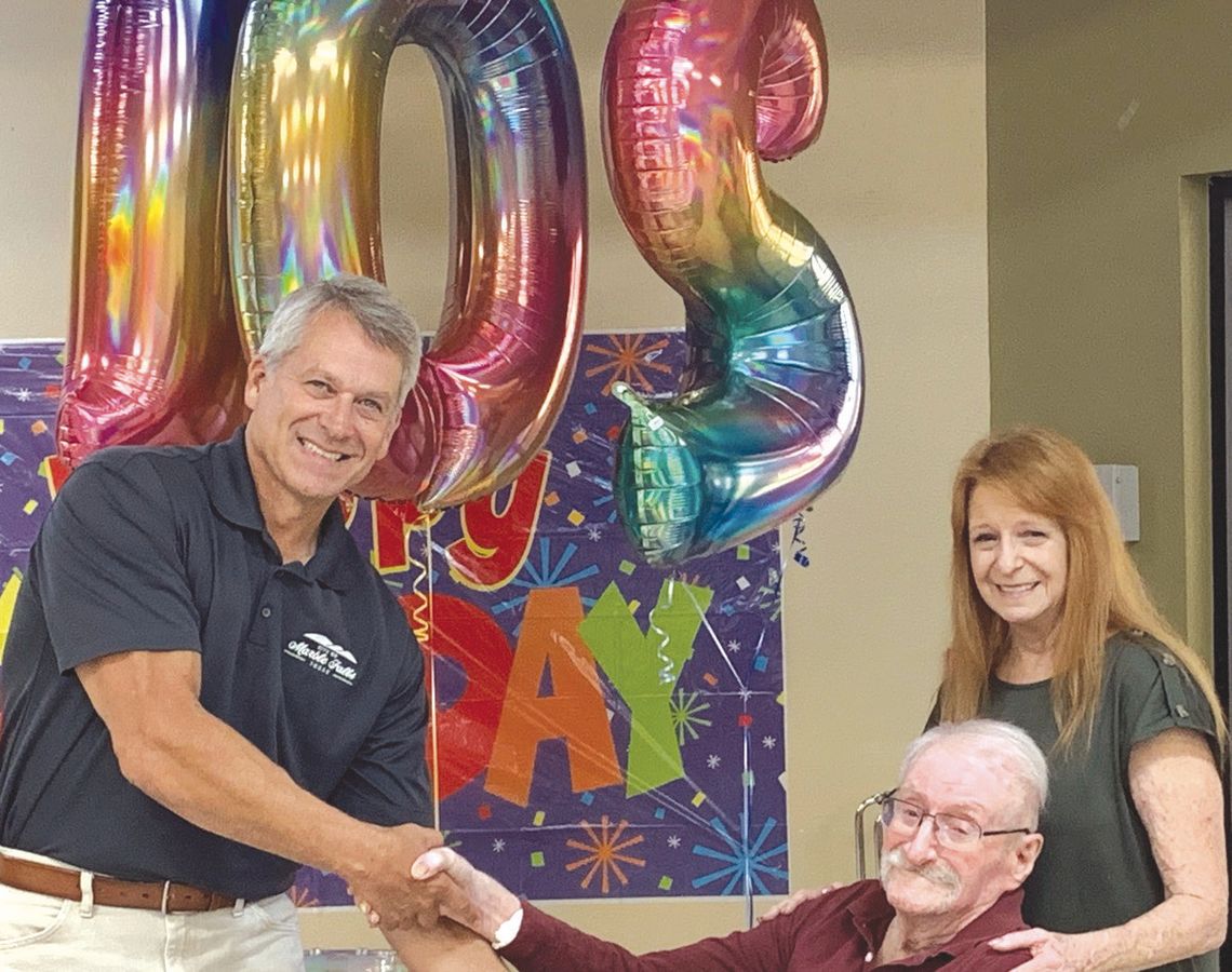 102-year-old Herbert Parsons and his daughter Georgia were congratulated by Mayor pro tem Craig Magerkurth, who awarded the Granite Mesa resident the key to the city of Marble Falls Sept. 26. Contributed Photo