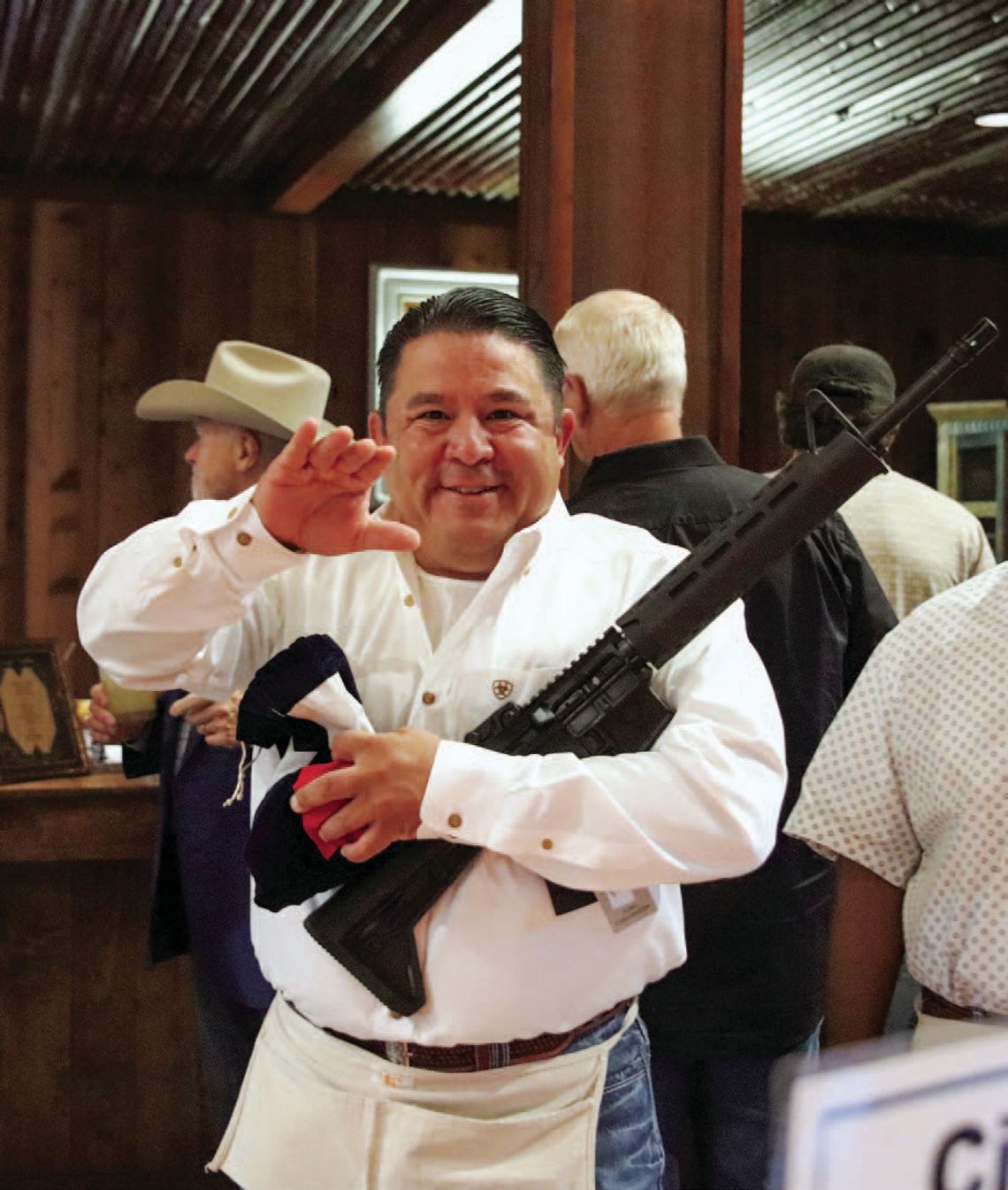 Advocacy Center event raises guns and funds