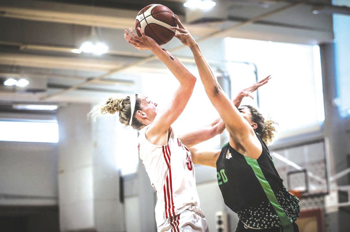 Known for her defense and protecting the rim, Mya Berkman blocks a shot to give her GAS Evnikos Women's basketball team another possession. Contributed photos