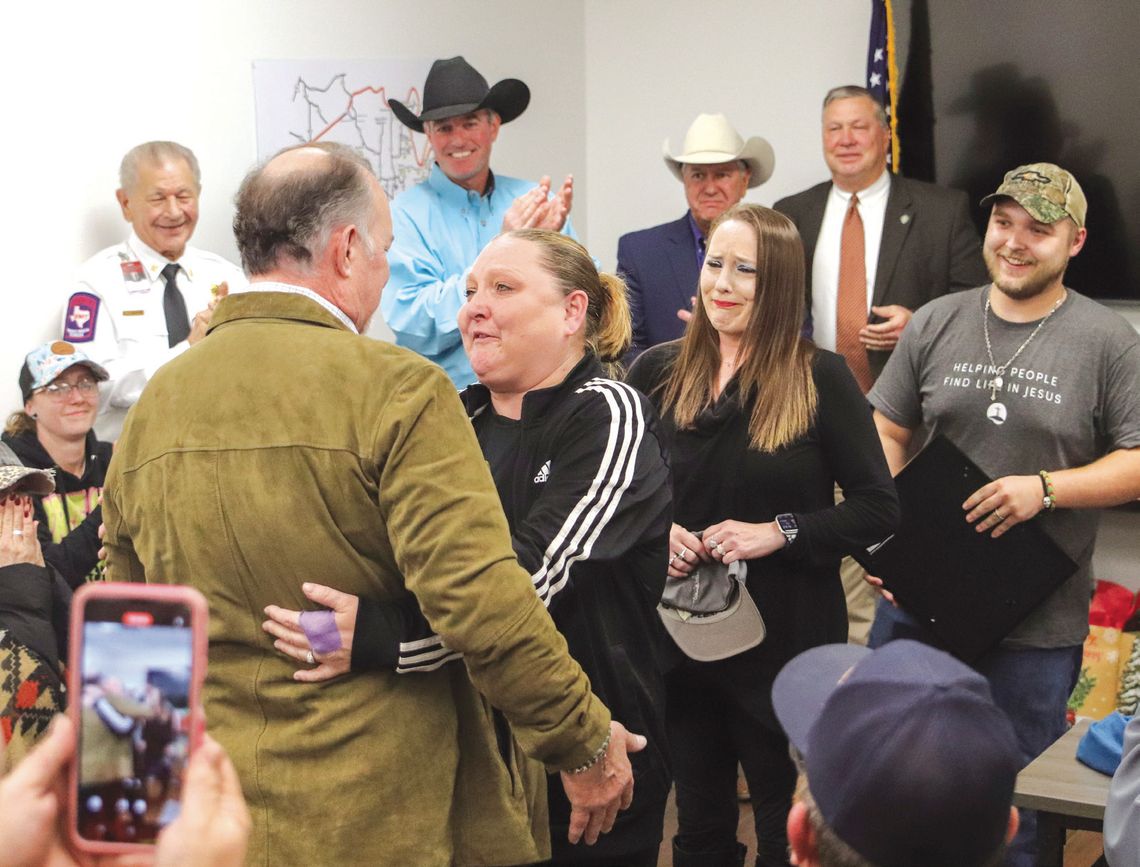 Martelle Luedecke/ Luedecke Photography Emotions overflowed when Scott Hendrix walked into the ceremony Dec. 10 at Spicewood Fire Rescue.