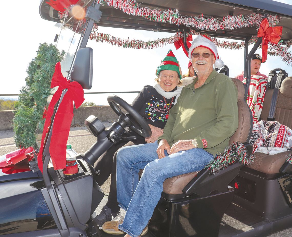 Christmas On Parade in Granite Shoals Granite Shoals residents Gail and Robert Monroe prepared for the Granite Shoals Christmas Golf Cart Parade. Find more photos on Page 8 Martelle Luedecke/Luedecke Photography