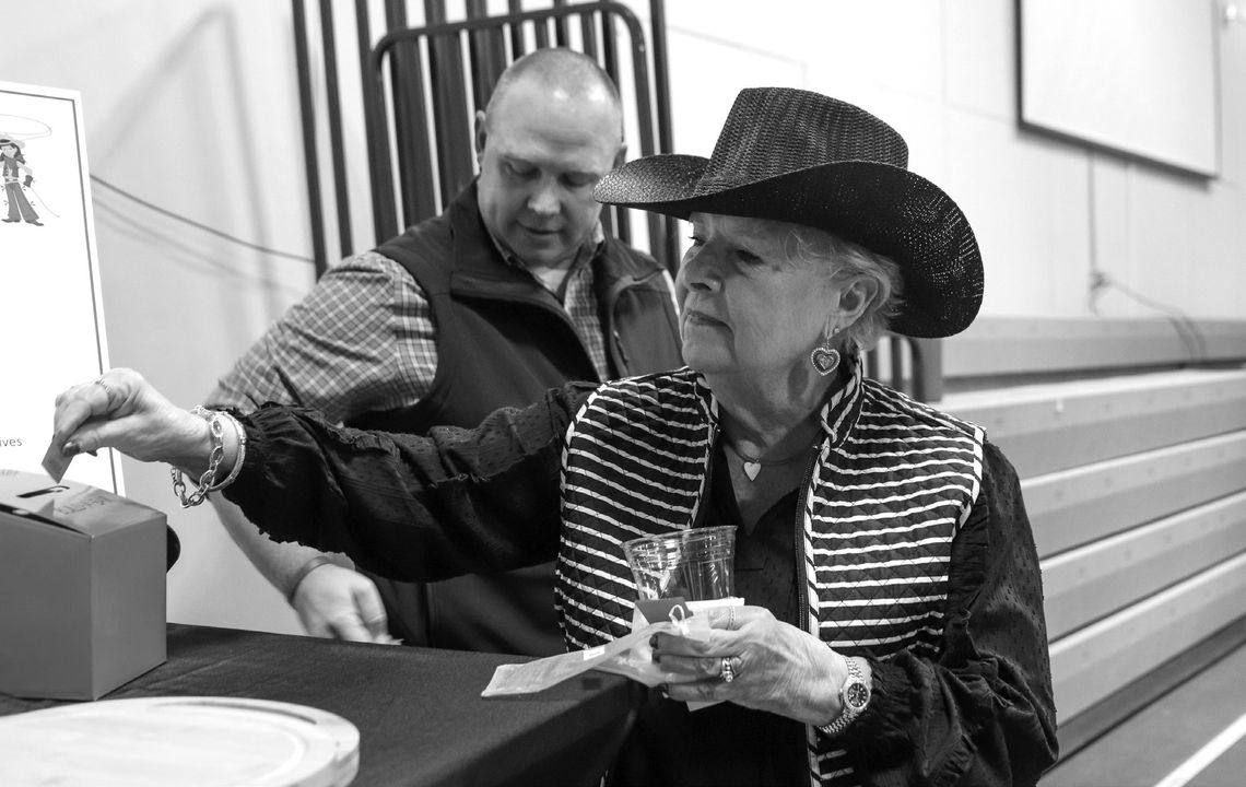 Sharon Lindahl placed her raffle ticket during the Highland Lakes Service League fundraiser Chuck Wagon Chow Down in 2024. Next year's event is Jan. 25. Martelle Luedecke/Luedecke Photography