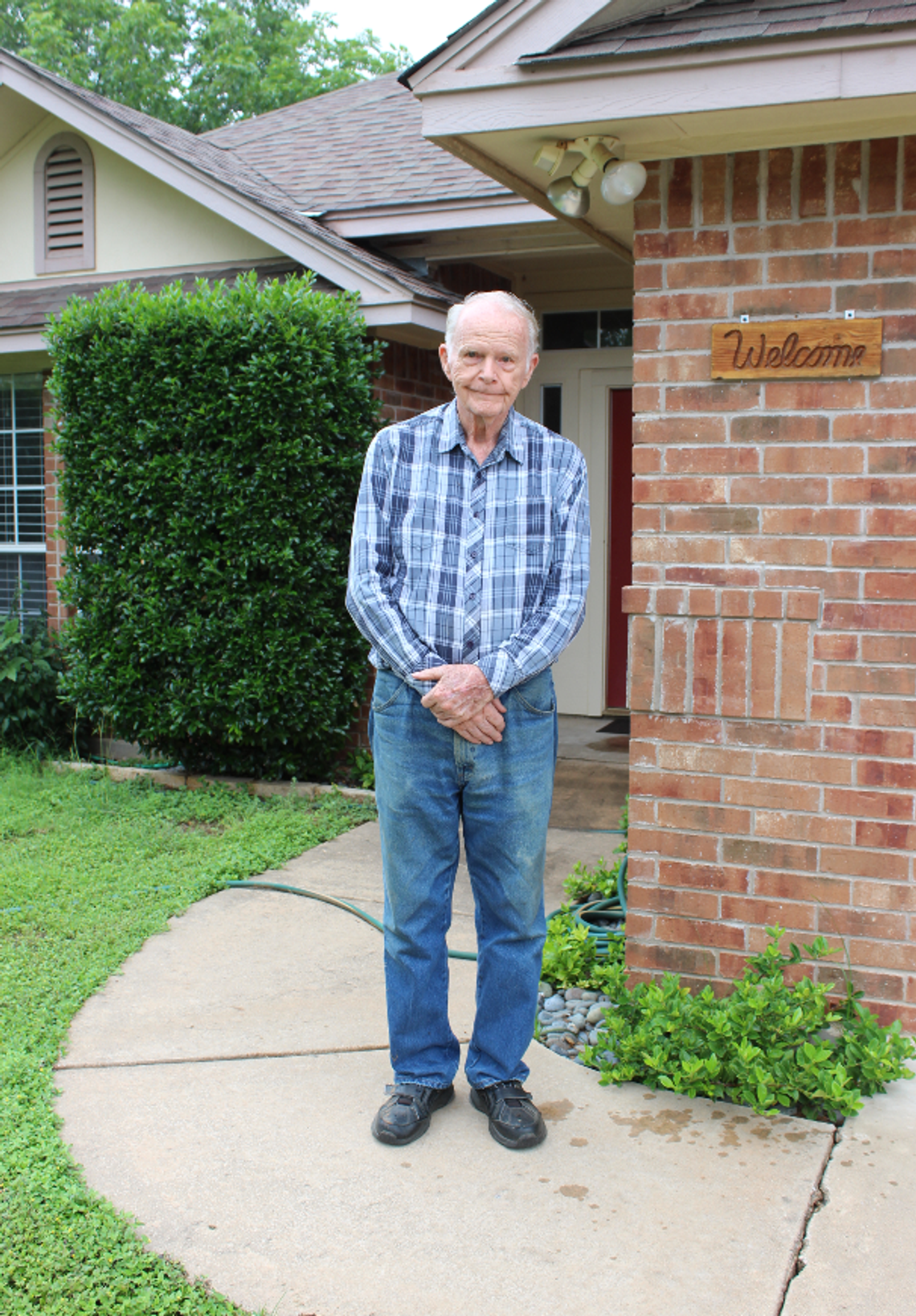 Connie Swinney/ The Highlander Arthur Ganung Jr., stood at his front door in the 1200 block of Cedar Drive in Marble Falls for the last time June 4 before his eviction.