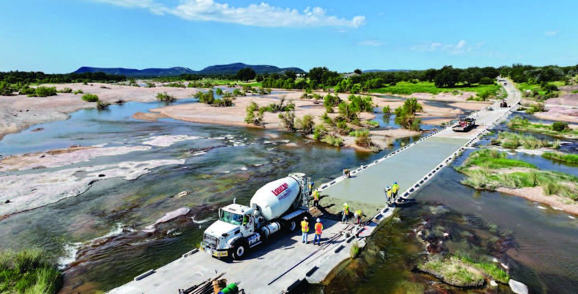 Crews lay foundation for flood-damaged Kingsland Slab