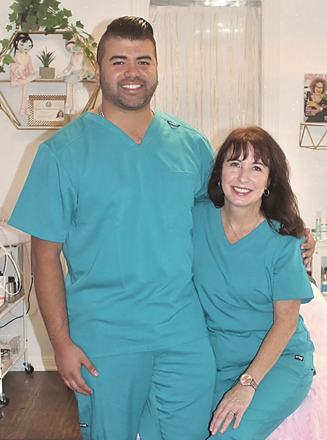 Uzziah Rodriguez and fiancee Tina Simpson welcome customers at the Fountain of YOUth Spa &amp; Boutique. Contributed/Rhonda Buchanan