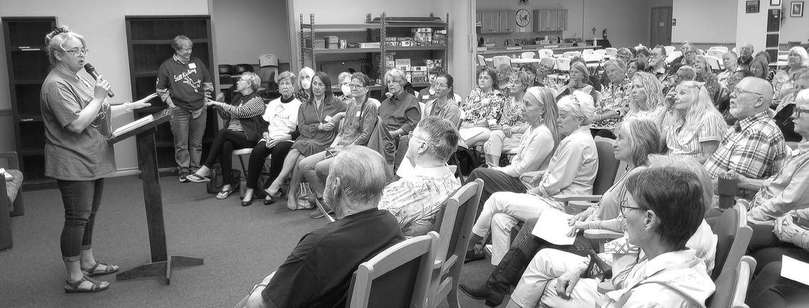 A crowd of nearly 70 attended the Highland Lakes Democratic Women's meeting at the Marble Falls Senior Activity Center to hear Suzette Baker describe her wrongful termination lawsuit against Llano County. Contributed photos