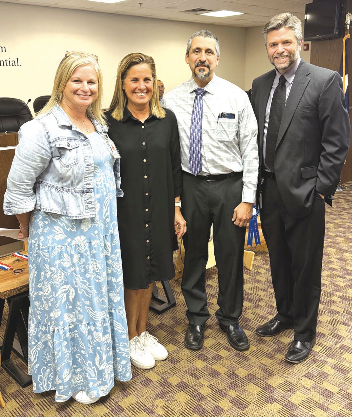 Pictured, from left, are MFMS Associate Principal Haley Wheeler, Shelley Cochran, MFMS Principal Rudy Gonza - lez, Superintendent Jeff Gasaway.