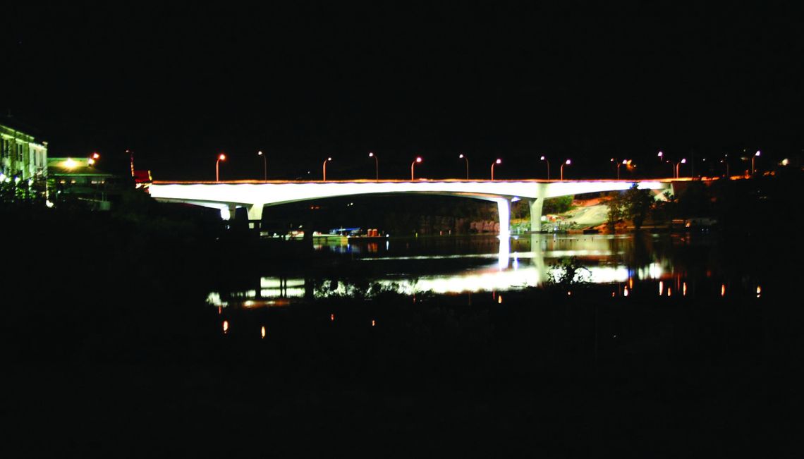 Current lighting on the U.S. 281 bridge glows under the structure. Connie Swinney/The Highlander