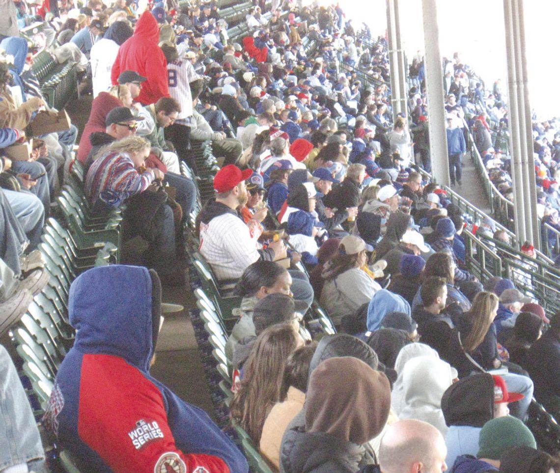 Hundreds of Chicago Cubs fans braved chilly weather April 26 at Wrigley Field as they watched their team battle the Philadelphia Phillies.