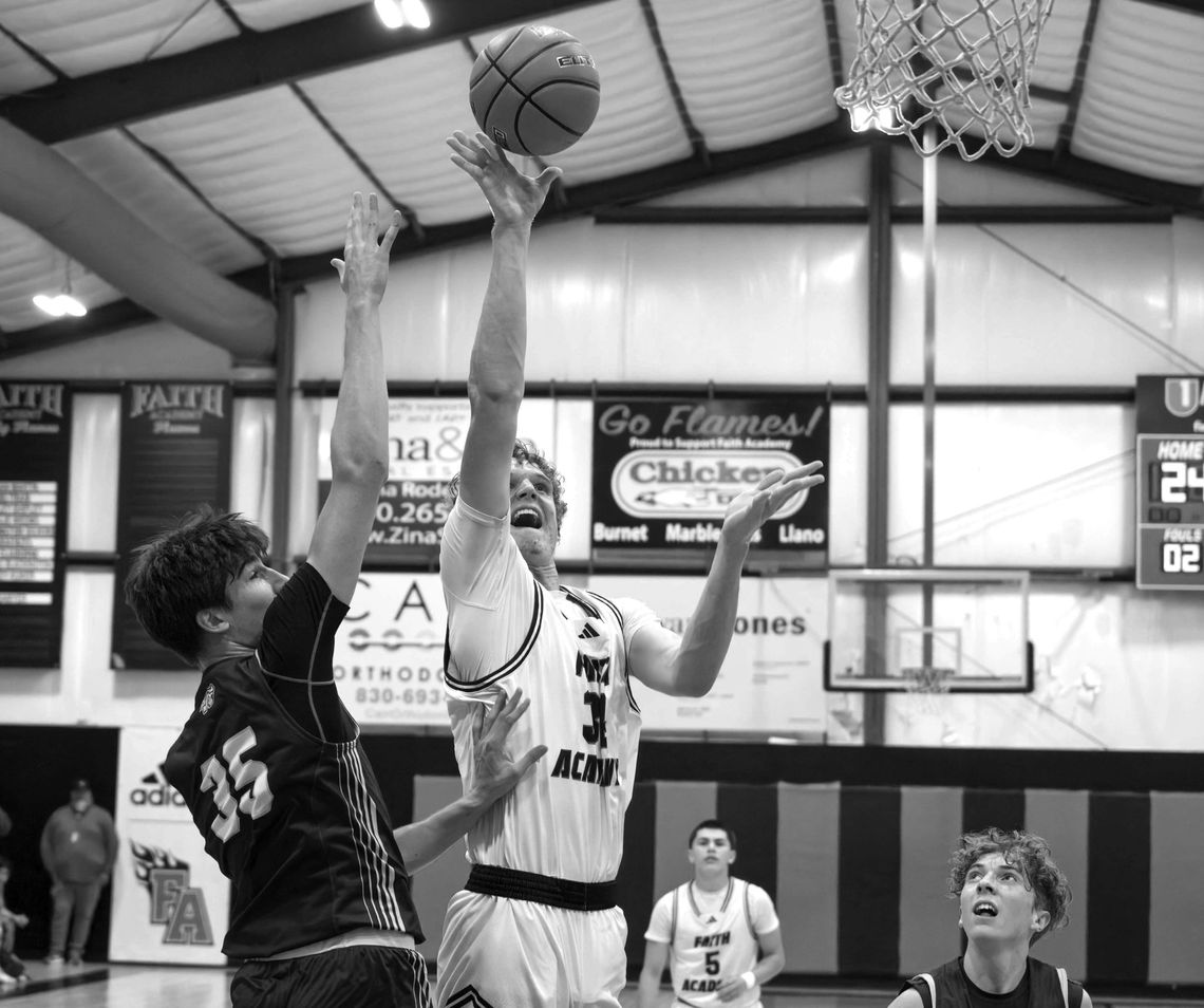 Contributed photos/ Stennis Shotts Faith Academy junior center Judah Phillips draws constant attention when he's in the lane.