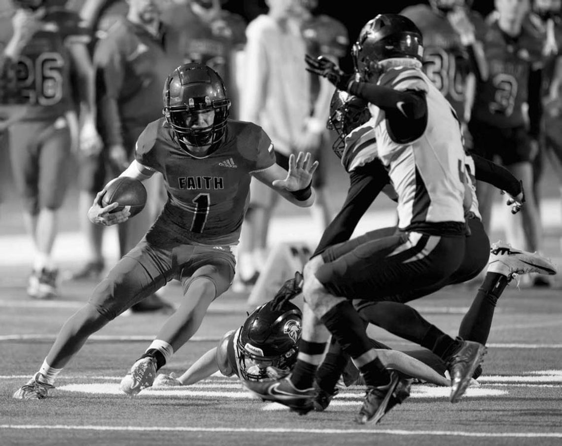 Faith Academy junior Andrew Houy stops on a dime to try to reverse his field. Contributed photos/Stennis Shotts