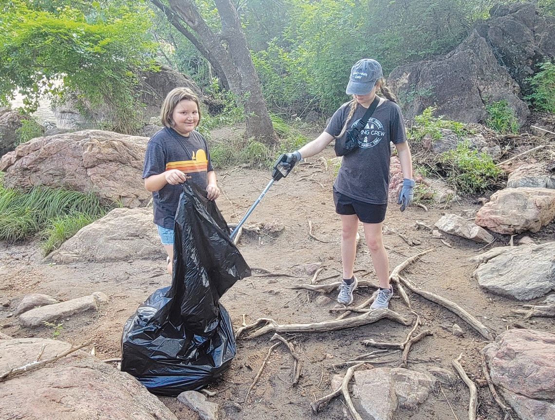 Girl Scouts help clean up Inks Lake State Park