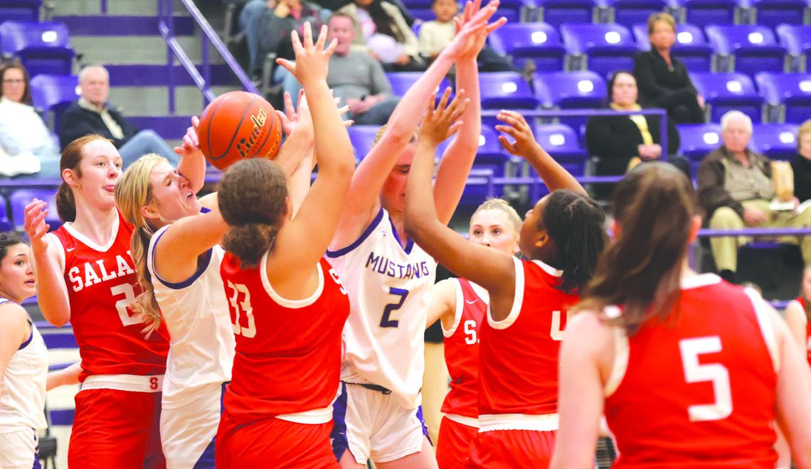 Salado packed the pain and didn't allow the Lady Mustangs, including senior for - ward Kylie Roberts (left) and junior guard Lila Pangborn, to get comfortable.