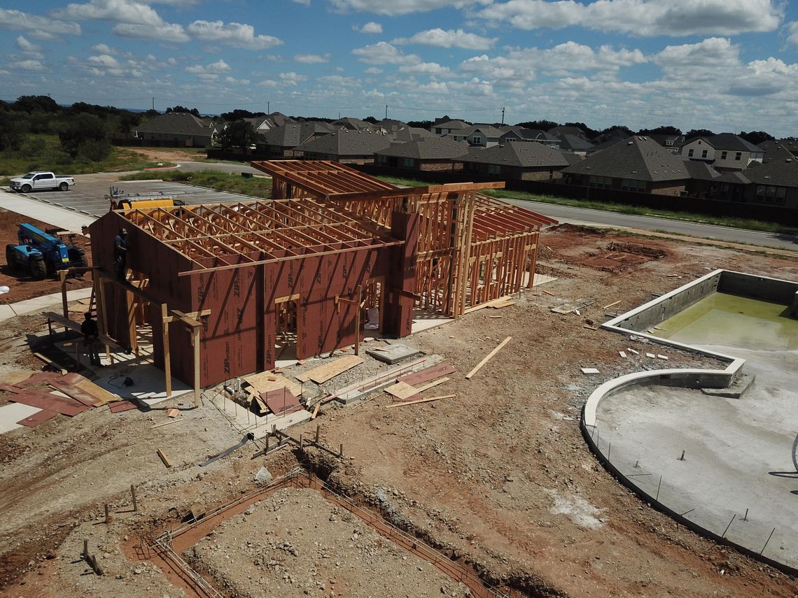 Construction has begun on the community center at Gregg Ranch with resident-focused features including a main swimming pool with lap lanes, a gathering space, multiple shade ramadas, and game courts.
