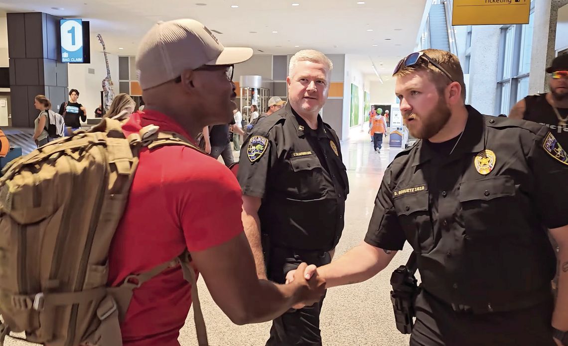 Contributed photo Granite Shoals Police Officer Cory Jones (left) greeted fellow Officer Dustin Schuetz at the airport in Austin. Capt. Chad Taliaferro (center) was among officers who welcomed him home.