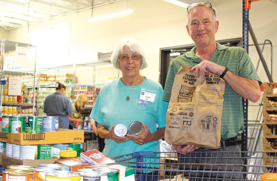 Helping Center benefits from Stamp Out Hunger campaign Photos by Beverly Walker/The Highlander Volunteer