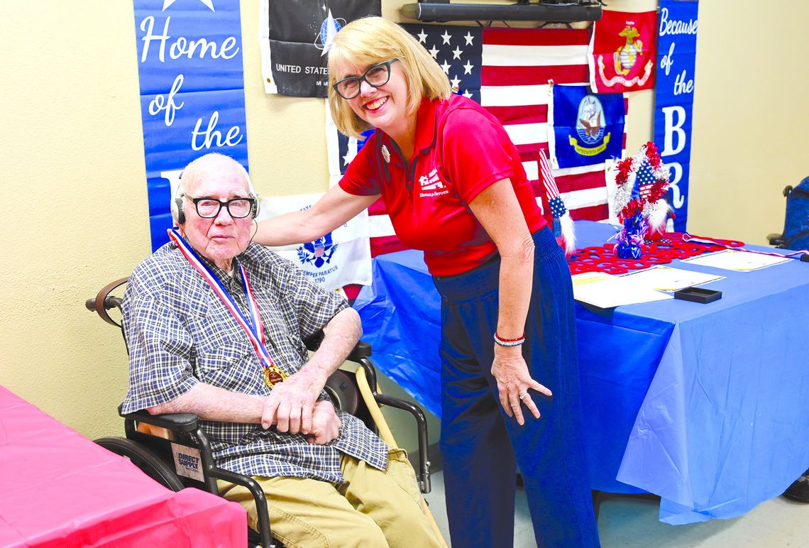 Contributed photo Bobby Sears received a 'Hidden He - roes' medal Sept. 12 in recognition of his service as a U.S. Navy veteran. Ruth Reed of Our House Real Estate coordinated the ceremony.