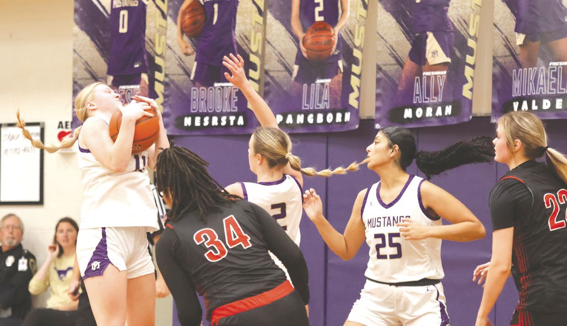 Marble Falls senior guard Caity Johnson is at the right spot to get a rebound. Photos by Jennifer Fierro/TexasChalkTalk. com