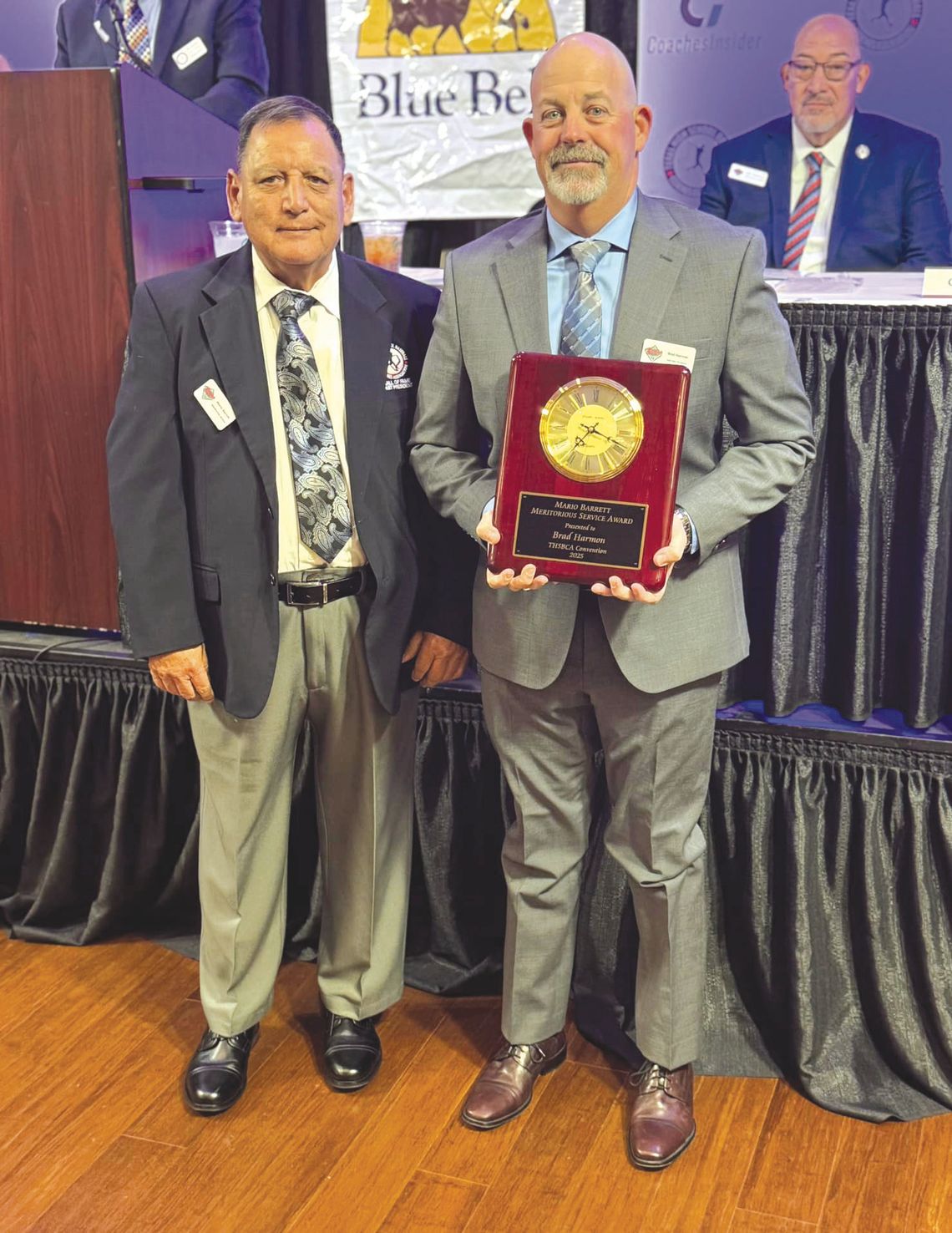 Mario Bennett (left) presents the Texas High School Baseball Coaches Association award named after him to Brad Harman, a 1994 graduate of Marble Falls High School. Contributed photo
