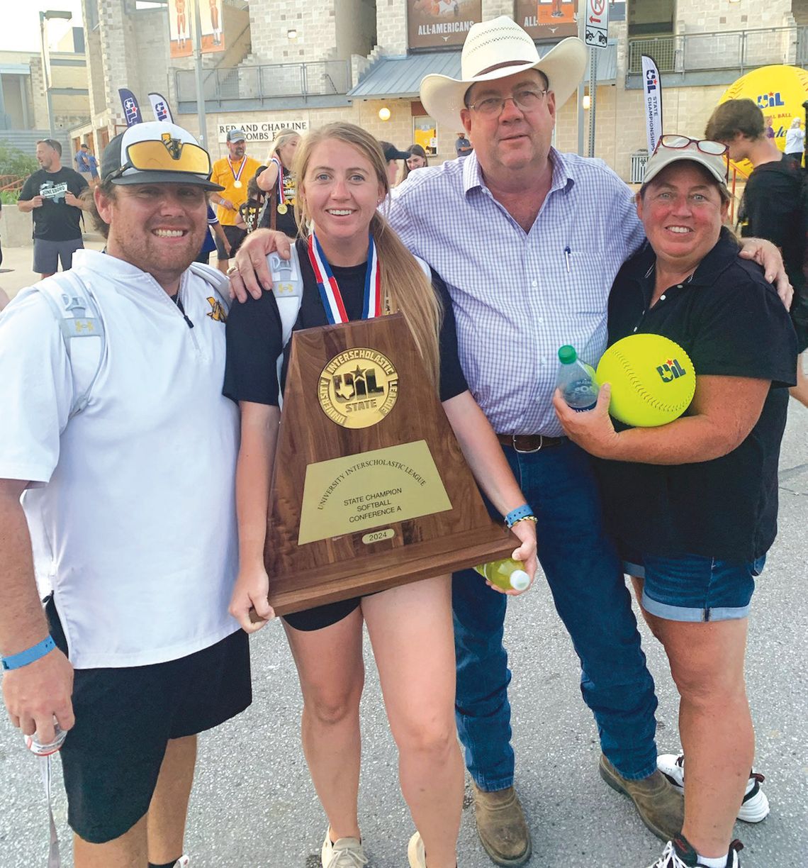 Jonesboro softball coaches Cody (left) and Amanda (Thomas) LeCroy celebrate winning the Class 1A state championship with Gary and Traci Thomas, Amanda's parents. Contributed photo