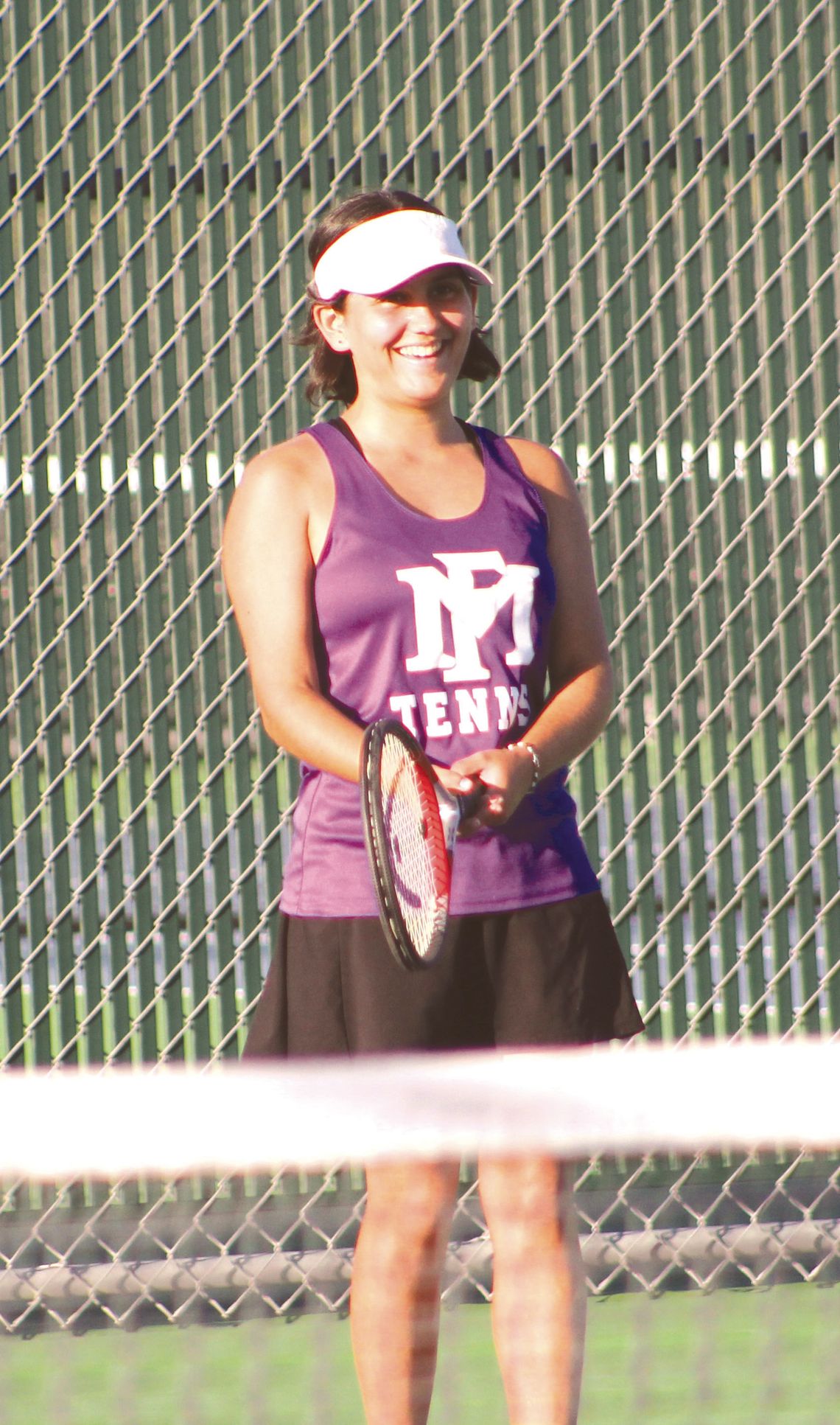 Nevaeh Nelson (Montoya) is all smiles after winning a point in match at No. 1 singles against Salado. Photos by Jennifer Fierro/TexasChalkTalk.com