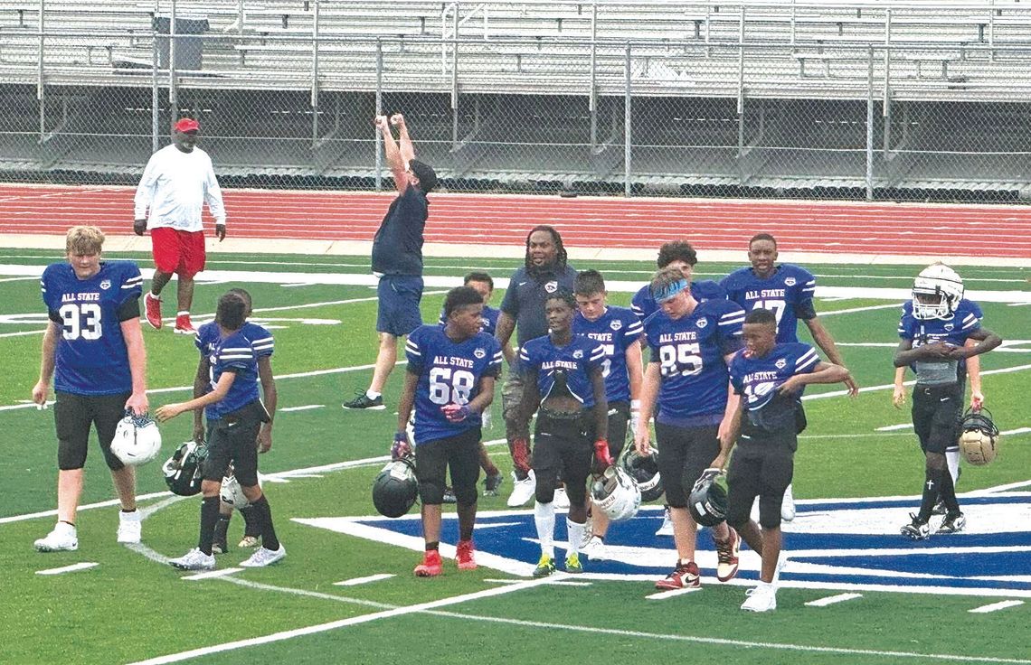 Marble Falls Middle School athlete Quincy Rodriguez (68) walks and talks with his teammates after the win. Contributed photos