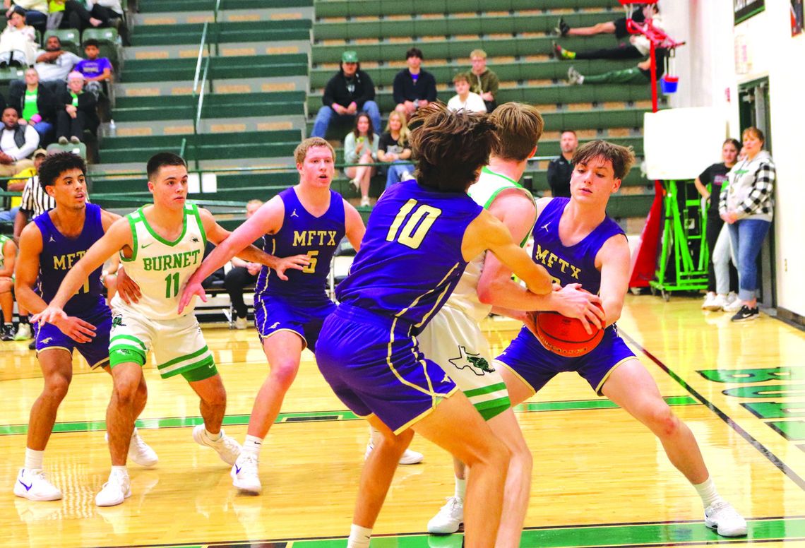 Marble Falls seniors Tidus Willie (left), Noah Lyon, and Garen Jones (10) and Reed Lewis commit to playing tenacious defense to make it difficult on the Bulldogs to make shots. Contributed photos by Martelle Luedecke/Luedecke Photography