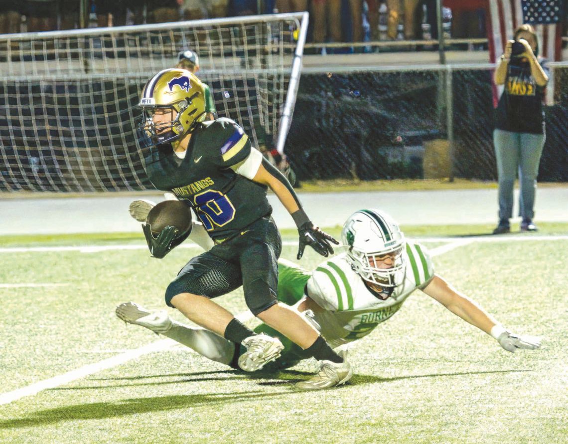 Marble Falls senior receiver Kole Becker steps through the arm tackle of a Burnet defender. Contributed photos/Stennis Shotts