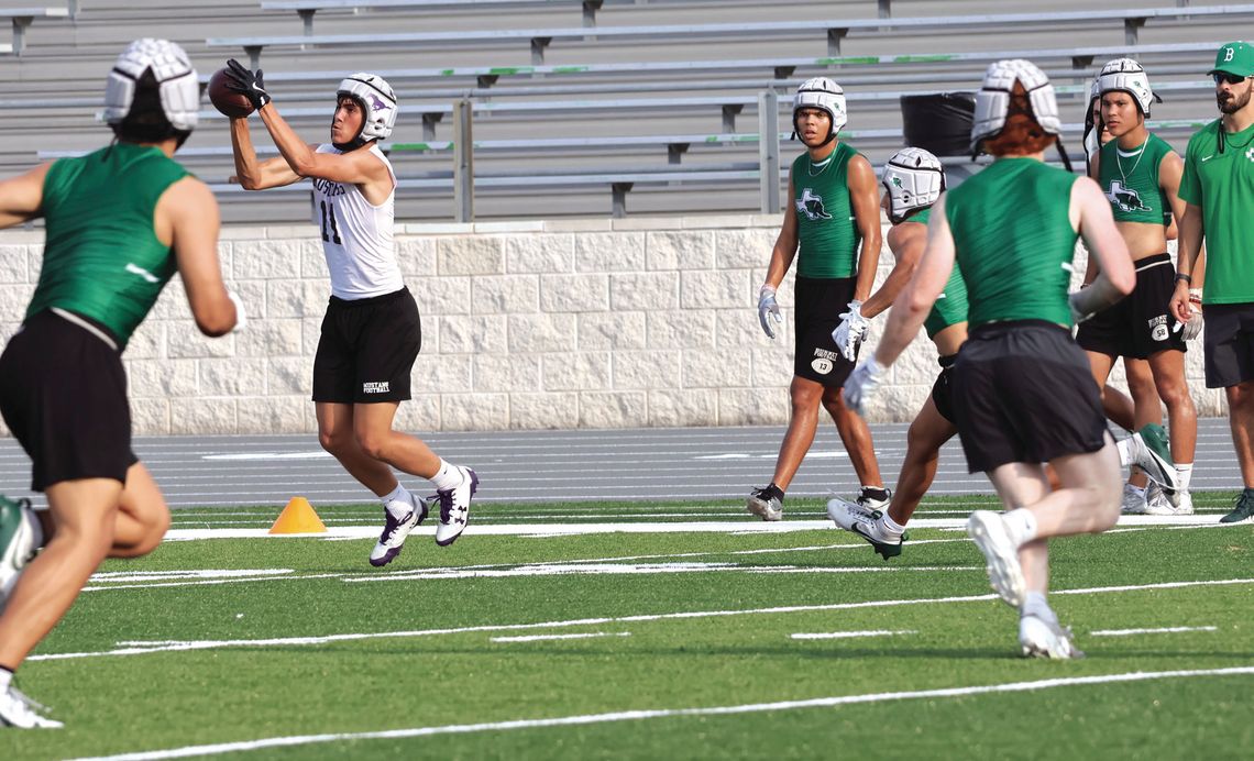 Marble Falls receiver Kaden Langbein catches a short pass before running for positive yards. Photos by Martelle Luedecke/Luedecke Photography