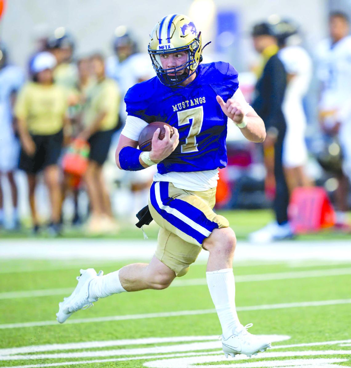 Marble Falls junior quarterback Doak Timmerman is on his way to score one of his many touchdowns against Austin Crockett. Contributed/Stennis Shotts