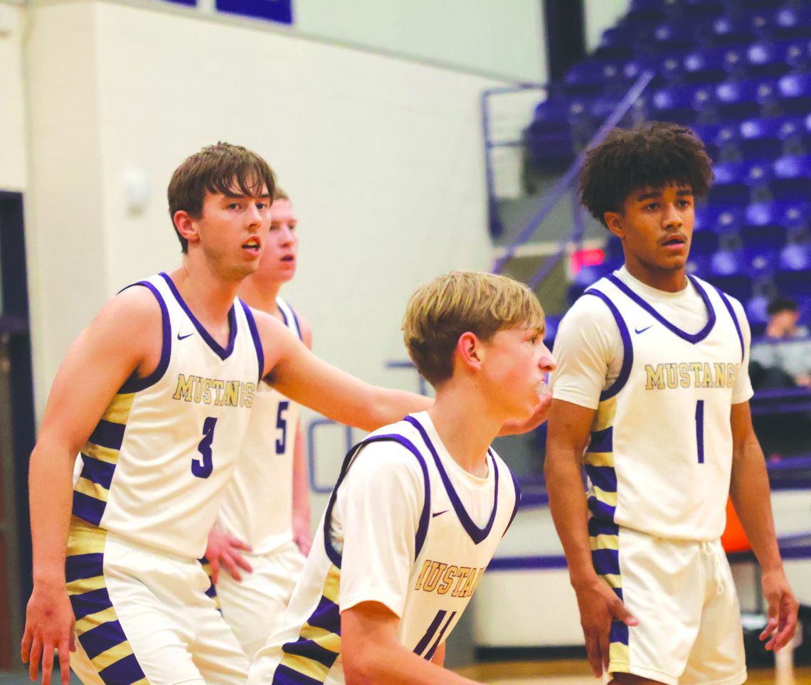 Jackson Trudeau (3), Beckett Berkman (11) and Isaiah Lazos are determined to finish the regular season strong.