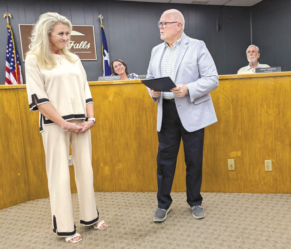 Proclamation ushers in Edwards Day of Service Marble Falls Mayor Dave Rhodes gives Kim Edwards the proclamation honoring Rick Edwards, her late husband, former Marble Falls ISD board member and beloved community benefactor. The Day of Service in his honor is scheduled for Feb. 14, when volunteers will descend on the community for phil...