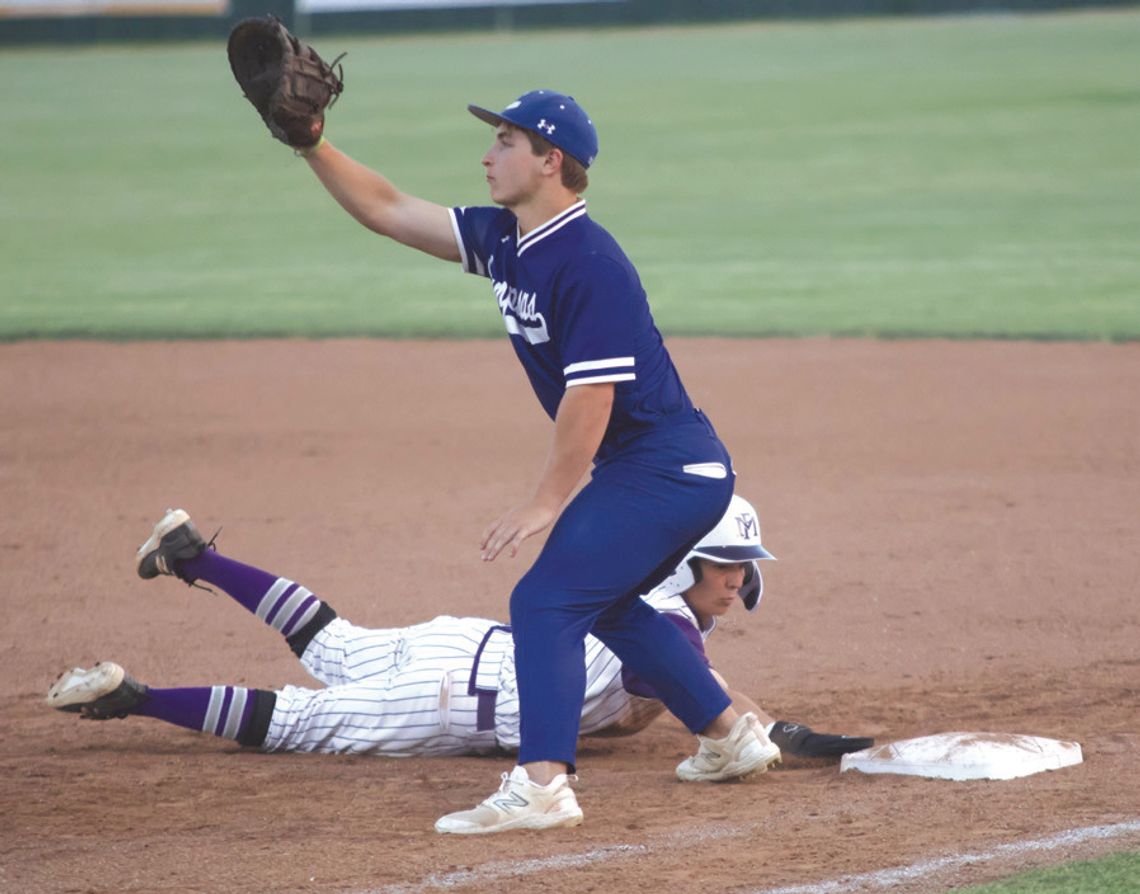 Marble Falls sophomore John Alan Whittle gets dirty as he dives to get back to first base and avoid the tag. The dirt is part of having natural grass at Scearce Field. Whittle's father, Marble Falls In dependent School District Assistant Superintendent of Administration Stan Whittle, playe...
