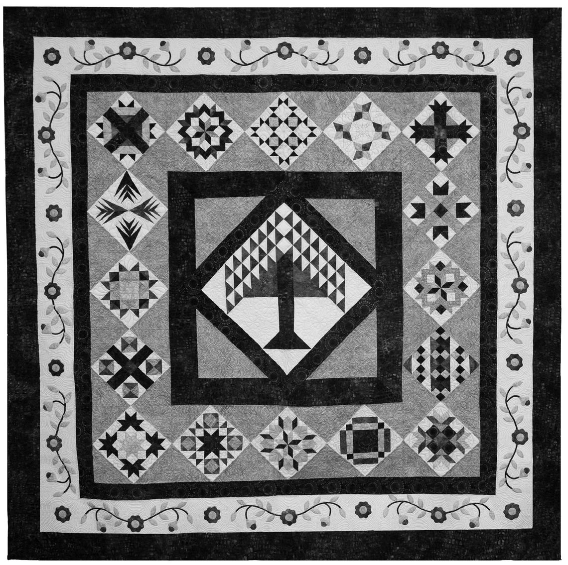 Attendees of the 2025 Quilt Festival might win 'Tranquility,' a queen-sized quilt sewn by the HLQ Guild members and quilted by Leslie Sparks. Tick - ets are available at the show or from members. Contributed photo