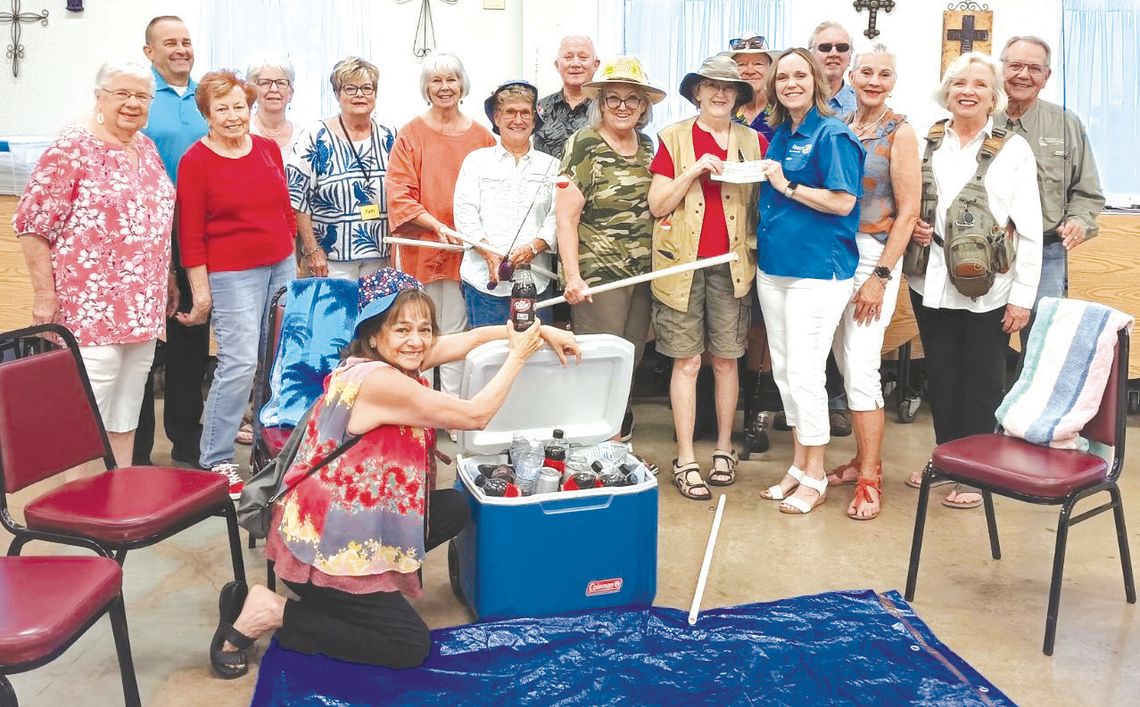 Pictured from left are: Jeanette Pickard, Marble Falls Rotary President Russell Sander, Gail Teegarden, Carolyn Alexander, Pam Parsons, Barbara Van Tassel, Melinda Wheeler, Rotary member Michael Hussey, Debbie Pridgeon, Allie Bennett, Allen Laughlin, Rotary Grant and Giving Committee Chair...