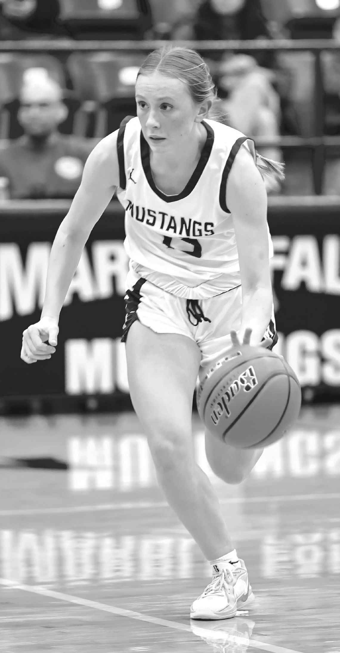 Senior guard Kenadie Cotton and the Lady Mustangs continue battling in a challenging District 24-4A.