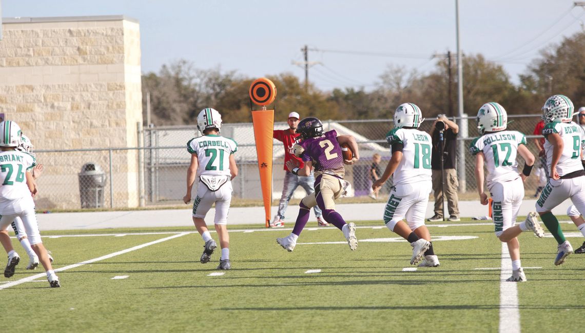 Marble Falls quarterback Charles Wood weaves his way to the end zone for the Mustangs' final score of 2024.