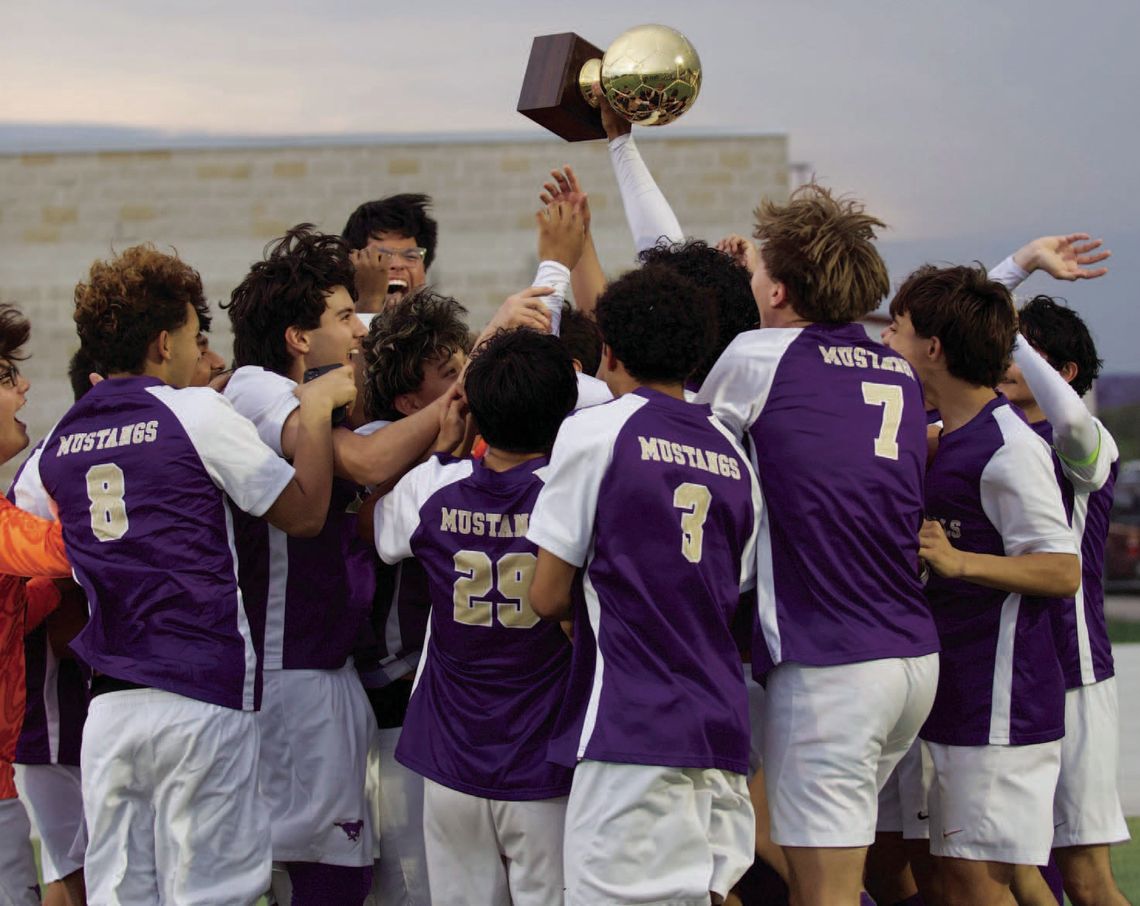 Soccer team handles 'unfinished business', wins district title