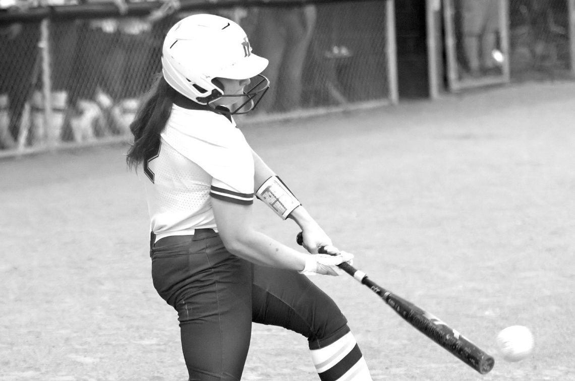 Jennifer Fierro/ TexasChalk- Talk.com Khloe Hollingsworth drives the ball for a RBI single to bring in a run for the Lady Mustangs.