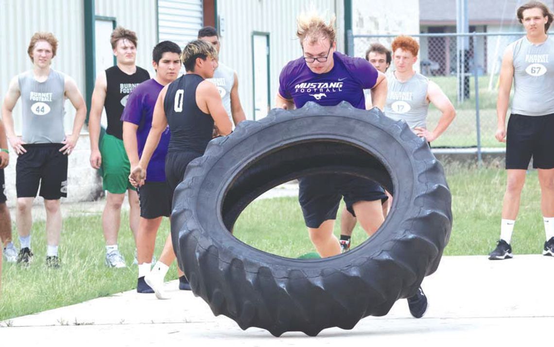 Part of what makes the Marble Falls ISD's athletic department's approach to getting stronger, faster and more agile is how strength-and-conditioning coordinator Karl 'Beef' Bielfeldt uses other disciplines to help his athletes, including Tyler Leverett, who is flipping a tire. Photos by Je...