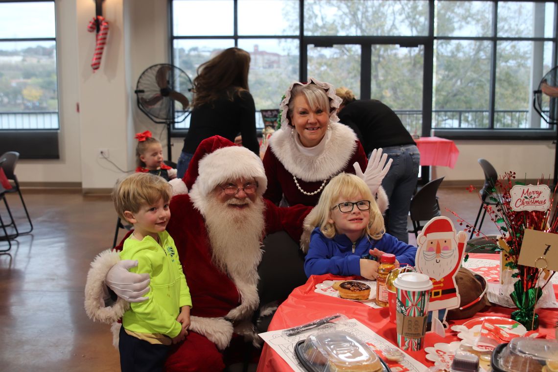  Santa (Ray Kessler) and Mrs. Claus (Cricket Kessler) visited Lakeside Pavilion for breakfast with Marble Falls residents Coleson and Cordyn Sauer Dec. 7 on the occasion of Breakfast with Santa, sponsored by Marble Falls Parks and Recreation.  