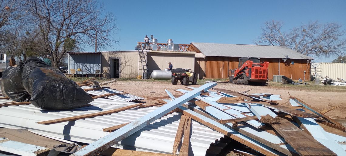 A crew began picking up the pieces March 5 after wind gusts swept the roof off Hoover's Valley Store, 7203 Park Road 4, just outside of Kingsland. Photos by Beverly Walker/The Highlander