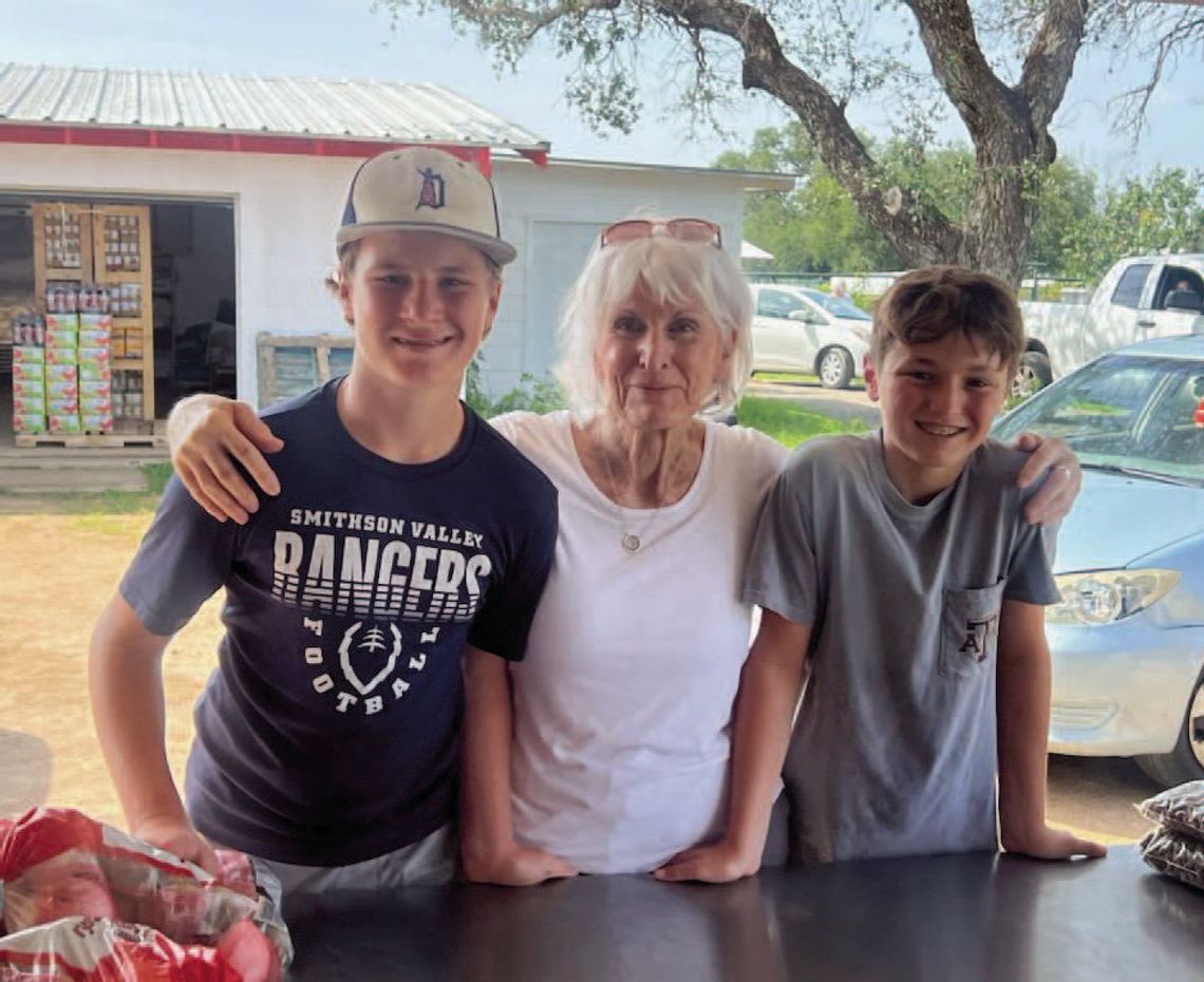 Youth volunteer at Sharing the Harvest food pantry