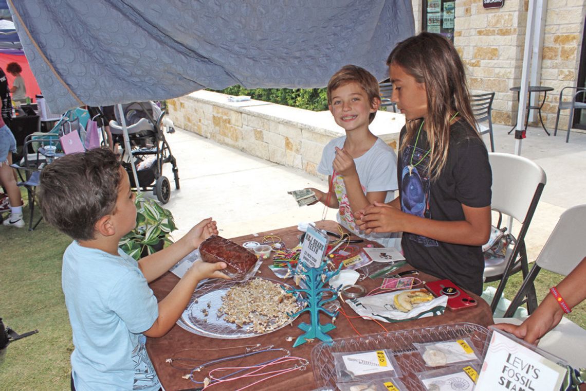 Youthful entrepreneurs shine at downtown market